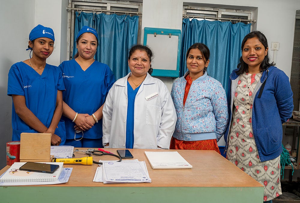 Dr. Neela with some of the women on her staff