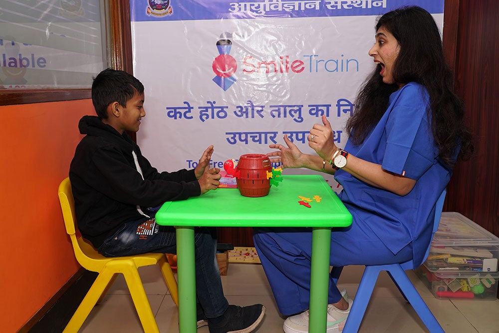 Payal looking surprised during a game with a patient
